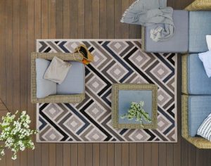 Top view of wooden terrace with comfortable wicker garden furnit 527bb511281128d22e1131e1ca6e1b20